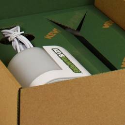 creating the promotional packaging from generic printing sheets with a wallpaper affect logo pattern.